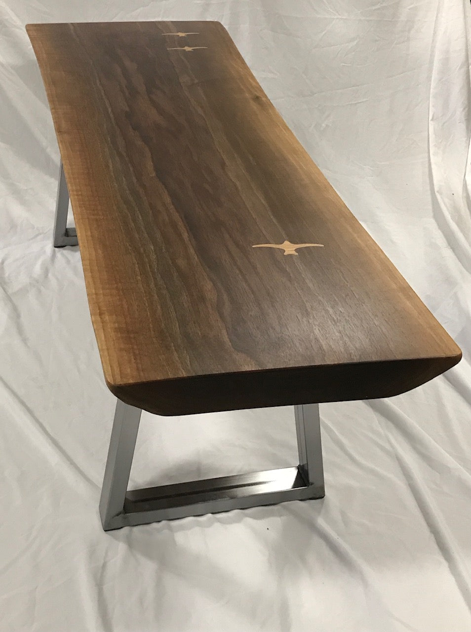 live edge walnut coffee table with white oak seabird inlay - end angle view